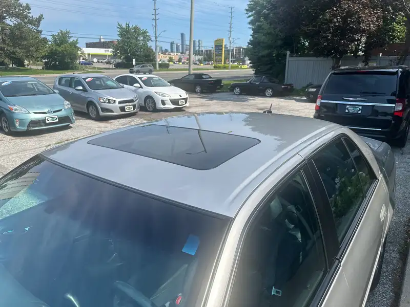 2005 Cadillac Deville 4dr Sdn, zlatá, 94 922 km, dovoz Kanada — foto 4 z 12