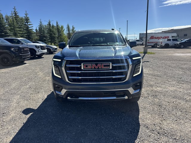2026 GMC Yukon Elevation, modrá, 6 km, dovoz Kanada — foto 2 z 4