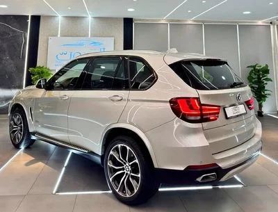 2017 BMW X5, zlatá, 100 600 km, dovoz SAE — foto 4 z 16