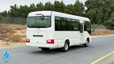 2025 Toyota Coaster, bílá, 0 km, dovoz SAE — foto 5 z 24