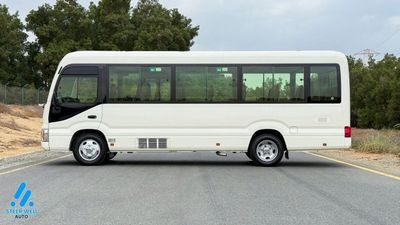 2025 Toyota Coaster, bílá, 0 km, dovoz SAE — foto 7 z 24