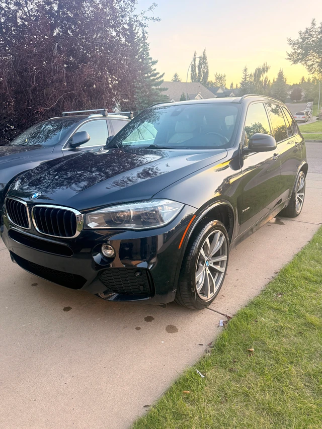 2016 BMW X5, modrá, 184 000 km, dovoz Kanada — foto 2 z 5