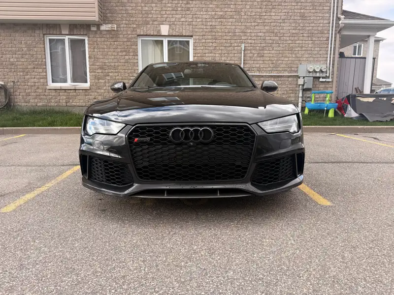 2017 Audi RS7 Performance, černá, 53 000 km, dovoz Kanada — foto 1