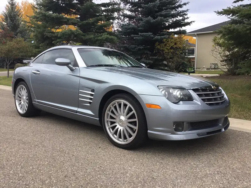 2005 Chrysler Crossfire SRT6, stříbrná, 33 000 km, dovoz Kanada — foto 1