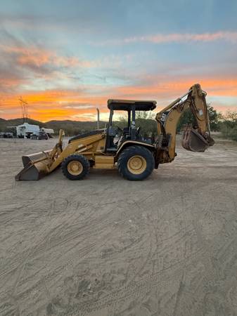 Caterpillar BACKHOE, zlatá, dovoz USA — foto 2 z 12