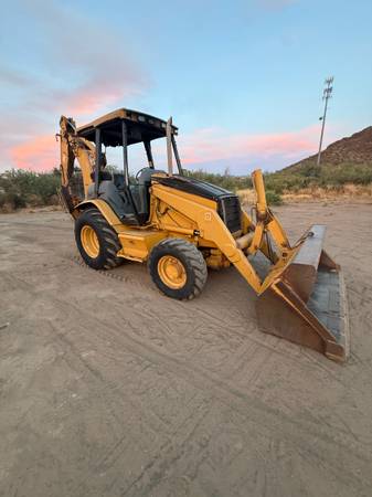 Caterpillar BACKHOE, zlatá, dovoz USA — foto 8 z 12