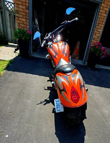 2013 Victory Jackpot, oranžová, 13 000 km, dovoz Kanada — foto 9 z 9