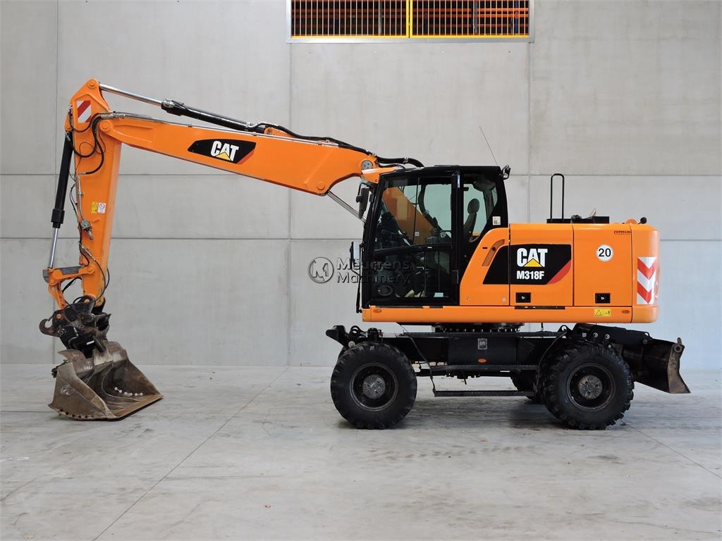 2017 Cat M318F, 10 208 mth, dovoz Skladem v EU — foto 1