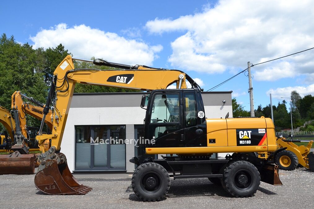 2012 Caterpillar 318, 9 500 mth, dovoz Skladem v EU — foto 4 z 16