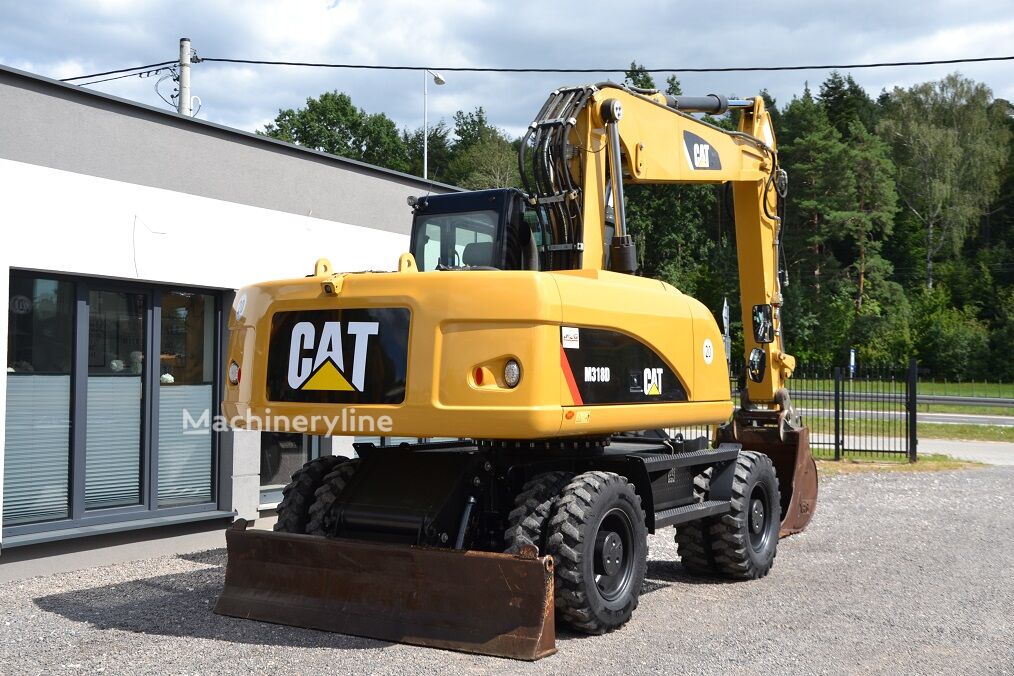 2012 Caterpillar 318, 9 500 mth, dovoz Skladem v EU — foto 9 z 16