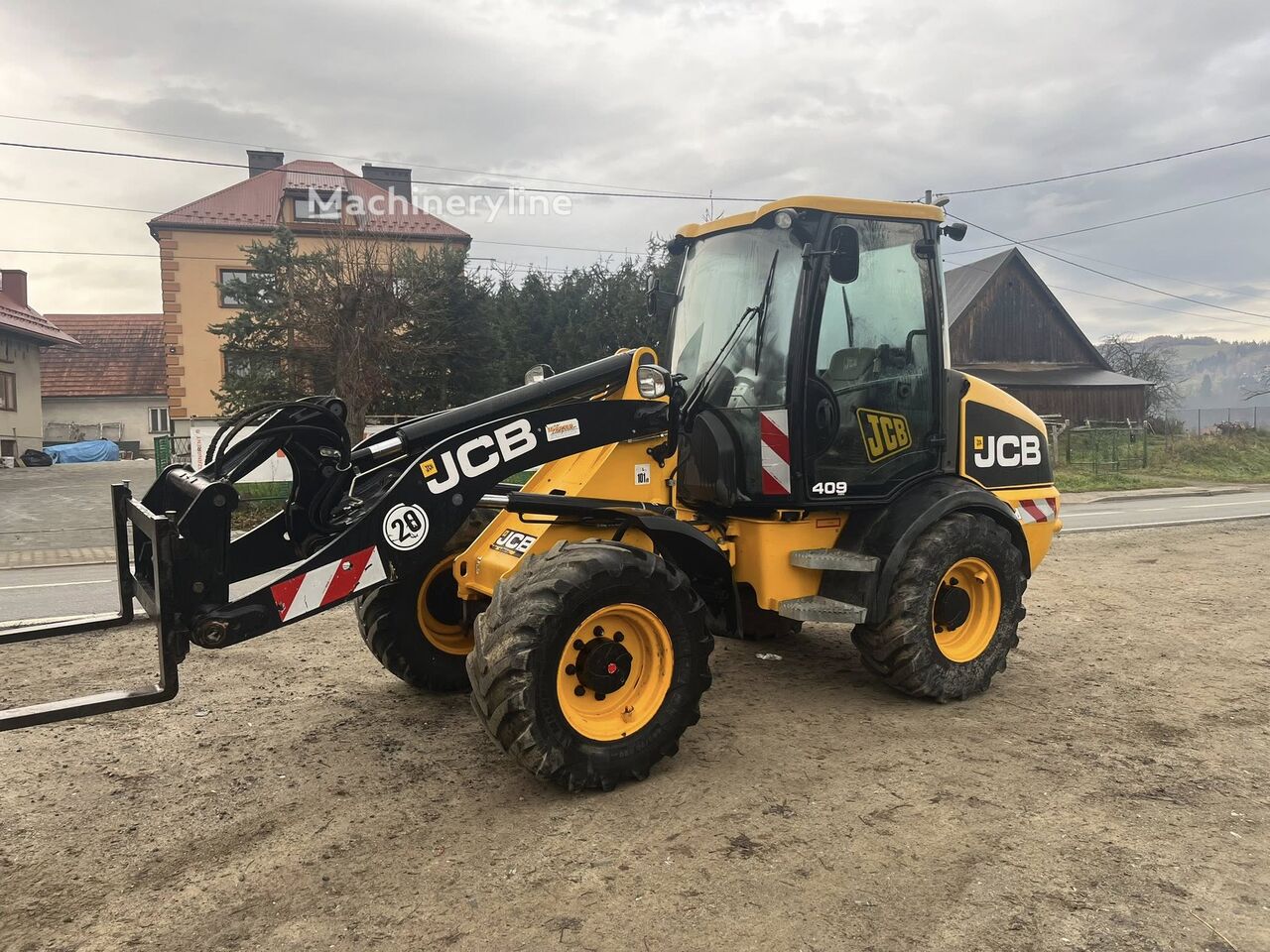 2012 JCB 409, 3 064 mth, dovoz Skladem v EU — foto 1